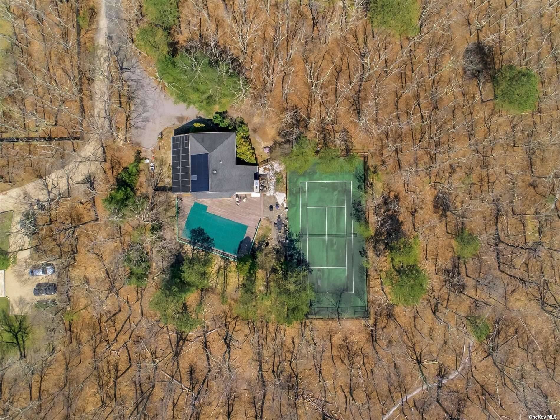 Family compound with in ground pool and tennis.