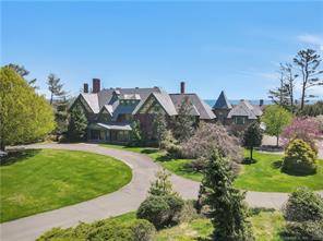 Award winning modern day Queen Anne Home sits elegantly on 3 private acres with spectacular Long Island Sound views in the enclave of Sasco Point.