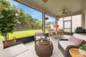 Back porch with covered lanai.