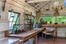 Charming potting shed with generous potting benches, abundant workspace, and period character
