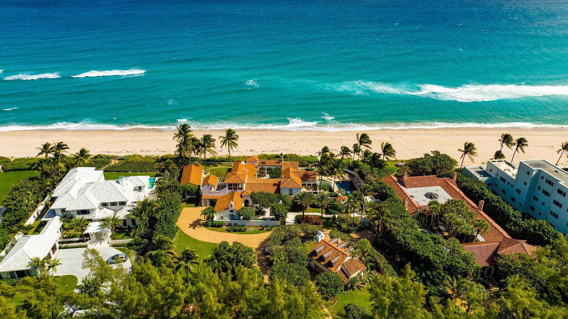 On lushly landscaped 1. 32 acres with 200 feet of oceanfront, this historic compound recalls the elegance of the 1920s.