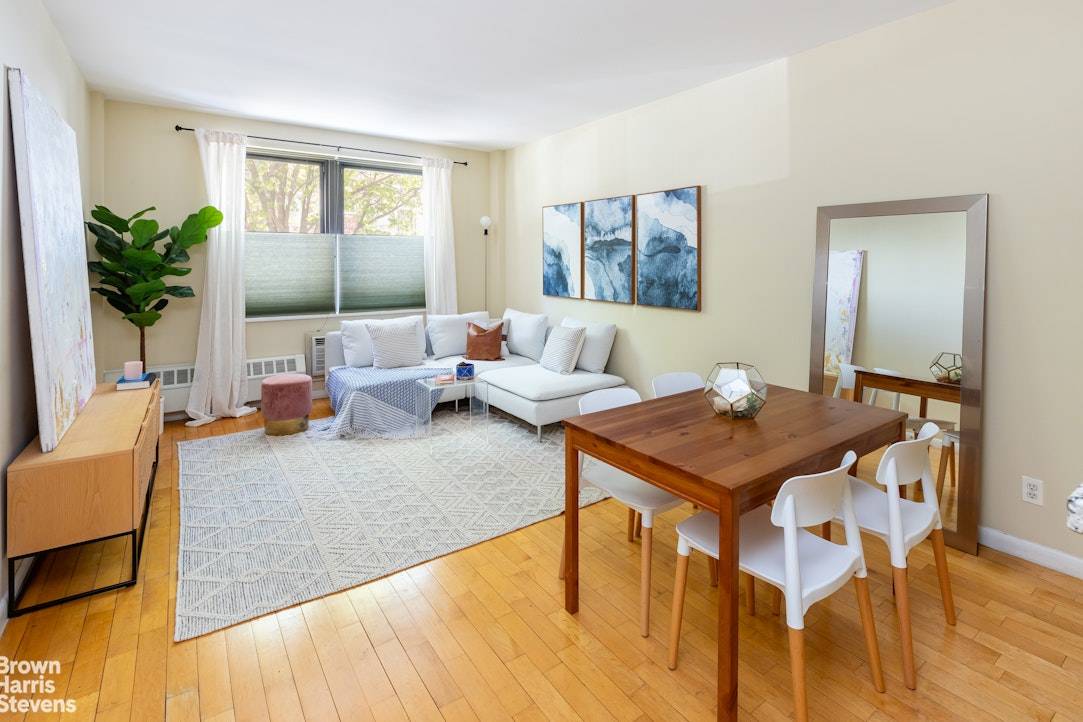 Spring is here ! This approximate 1100 square foot duplex with a truly oversized private garden is currently used as a two bedroom one and a half bath providing extremely ...