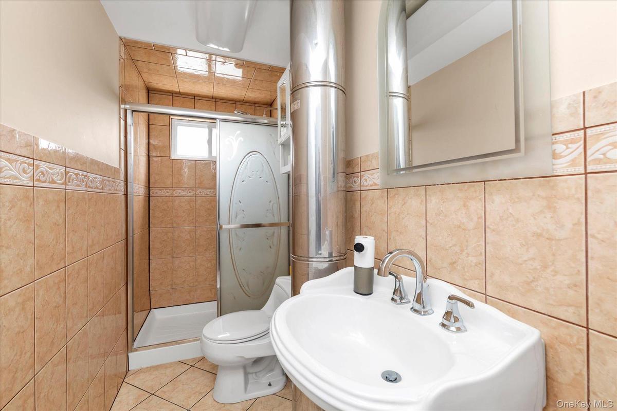 Full bath upstairs with shower stall