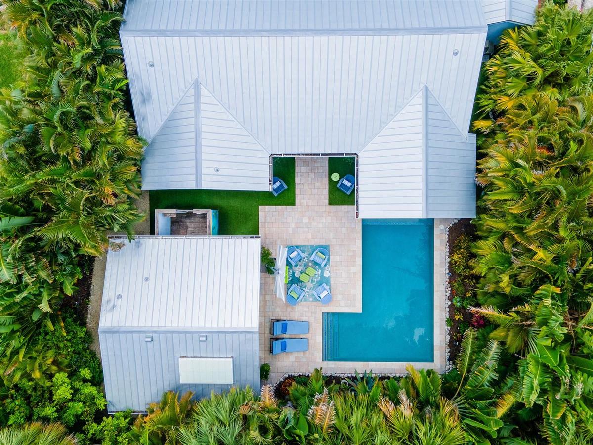 Aerial view of the main house, casita and pool area.