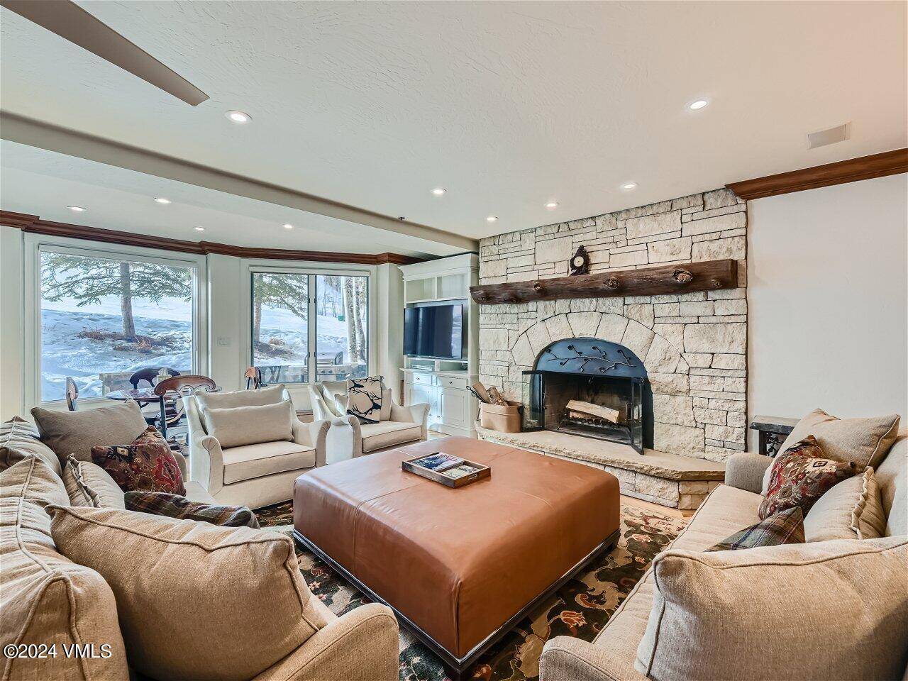 Immerse yourself in the pinnacle of mountain living with this meticulously remodeled 4 bedroom plus den haven, nestled slope side in the heart of Beaver Creek.
