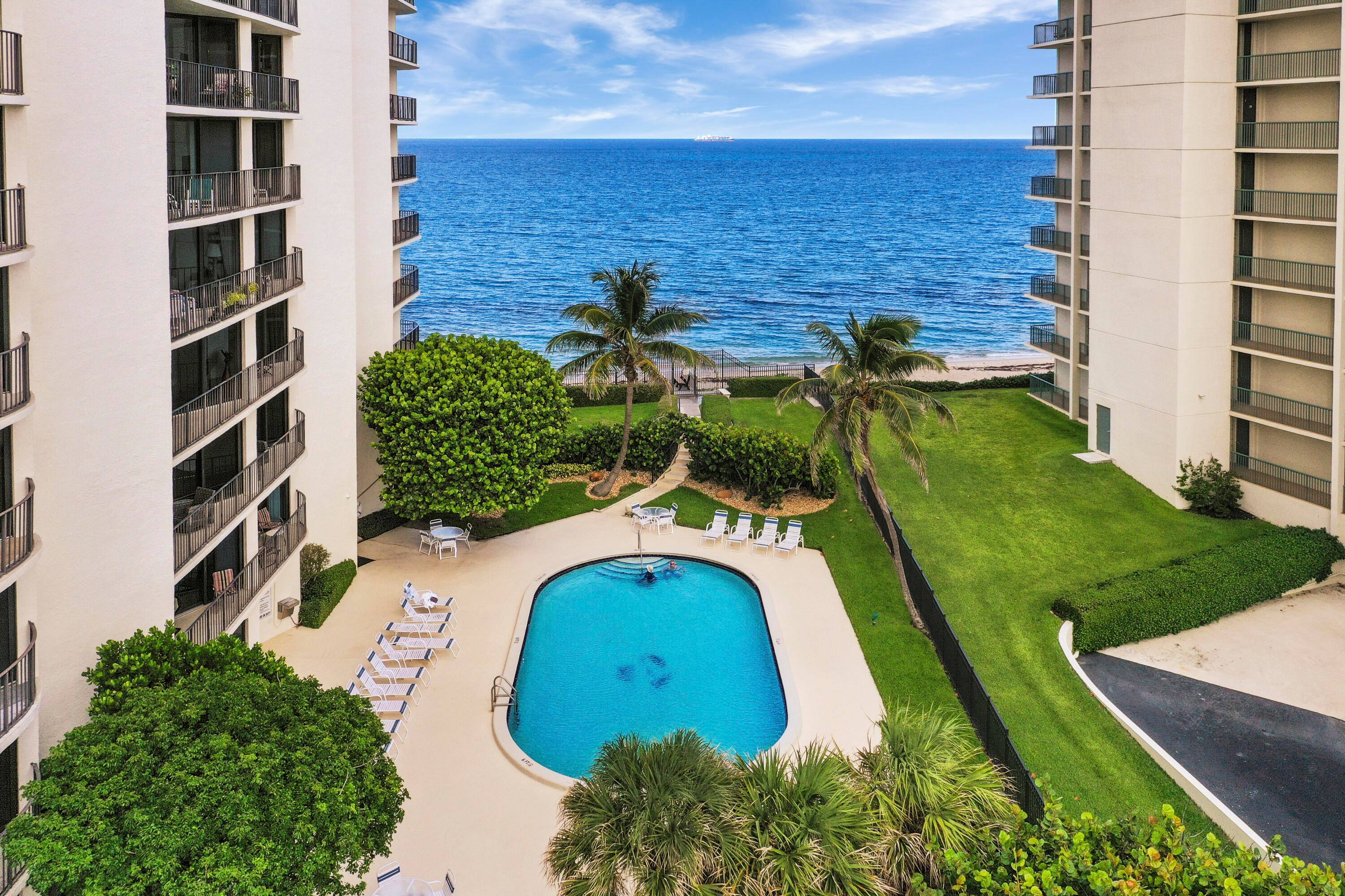 Seasonal rental. Spacious open concept corner condo with stunning views of the ocean and intracoastal.