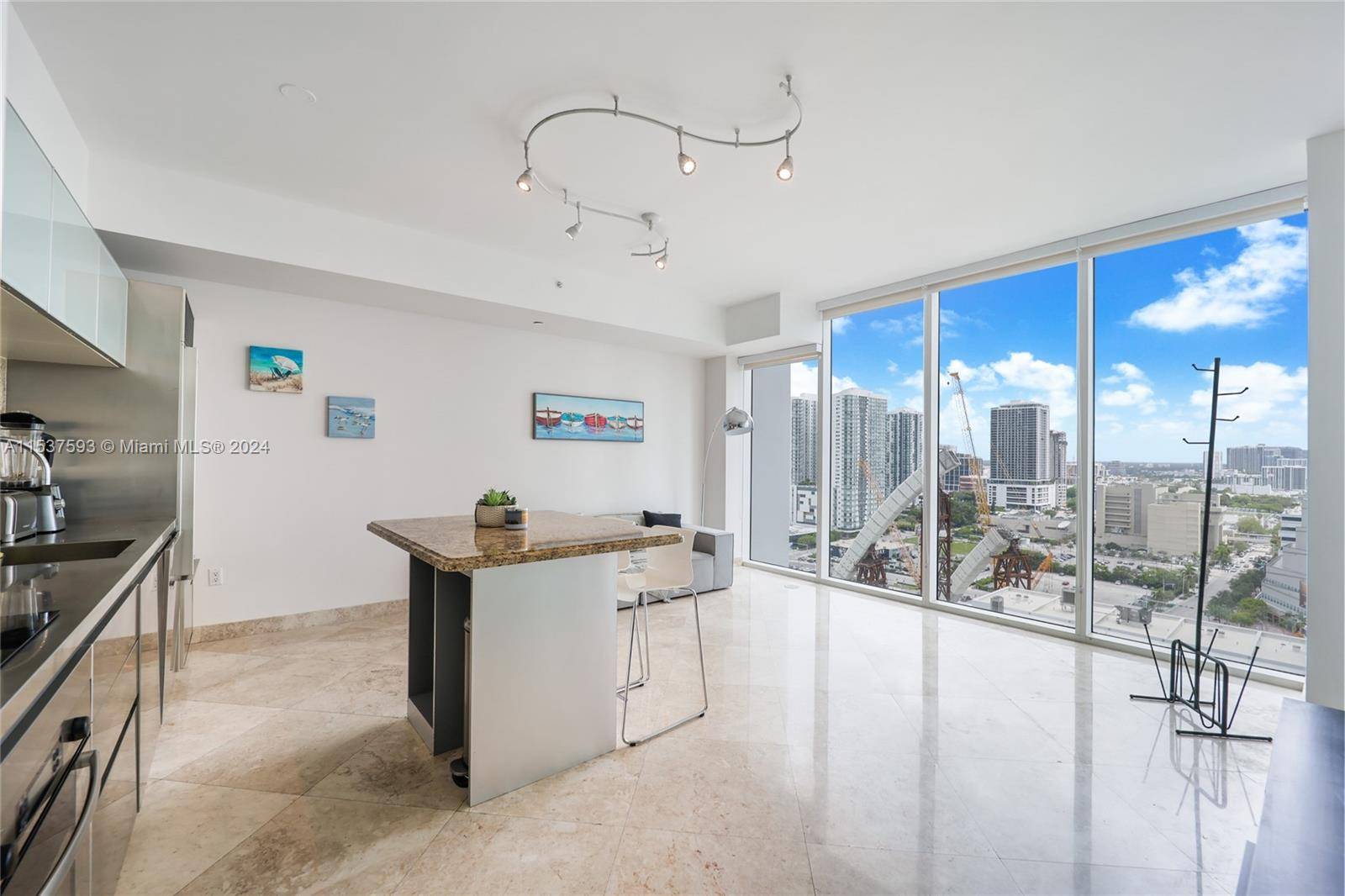 Cutting edge architecture by Chad Oppenheim, mesmerizing views, and one of the most sought after locations in town make this unit at Ten Museum Park a must see.