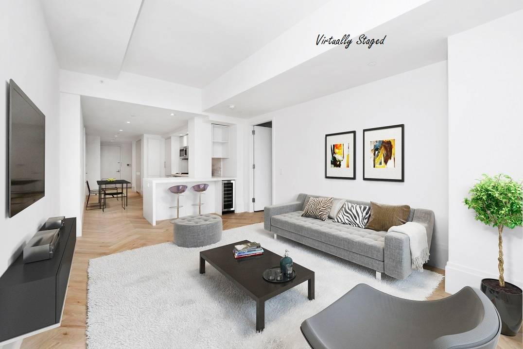A stunning, never been lived in condo with a gorgeous view of the East River, this 2 bedroom, 2 bathroom apartment is an exemplar of urban luxury.