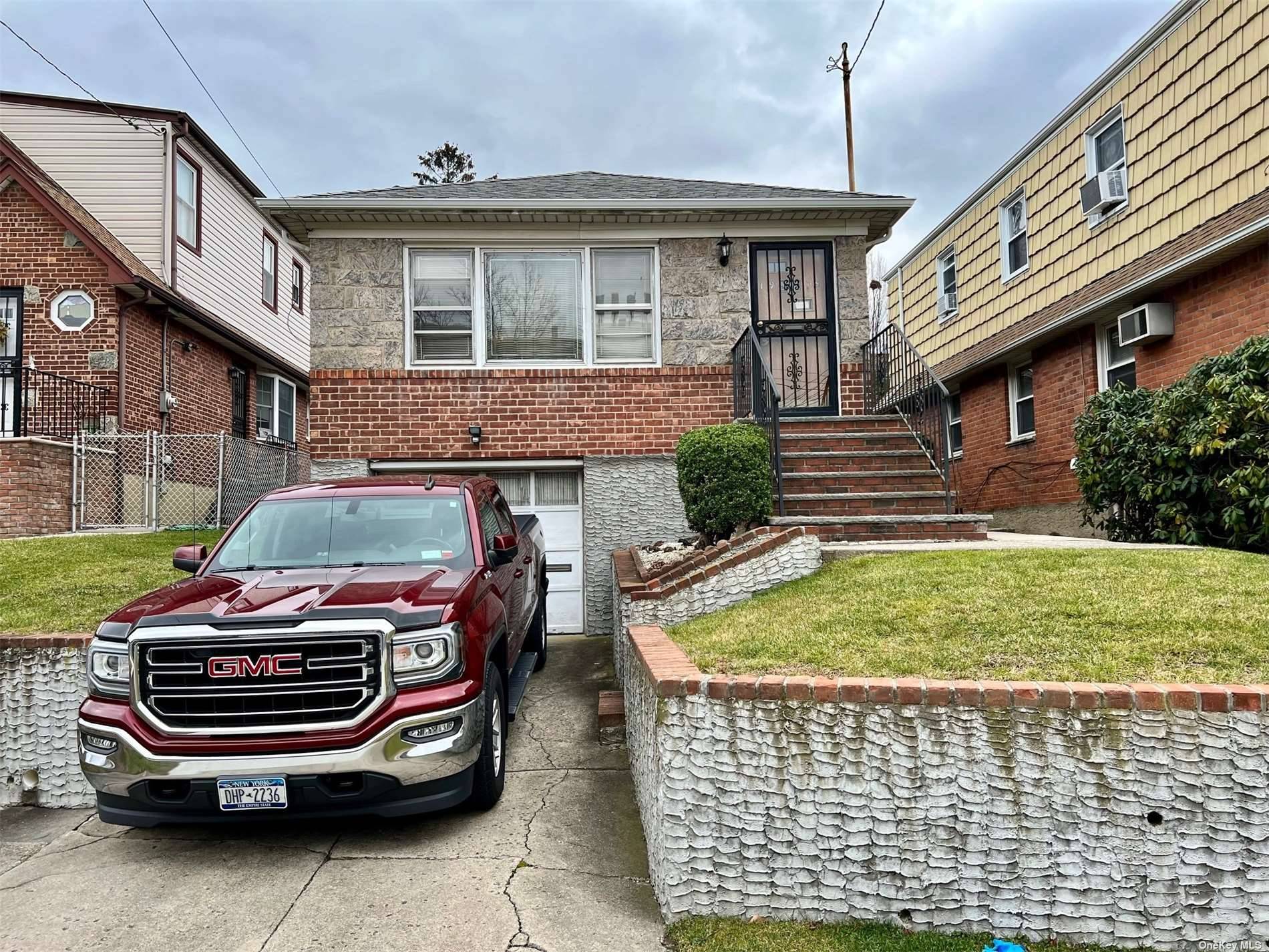 This two bedroom one bathroom home with finished basement, attached garage and private driveway is situated in a premier area of Whitestone.