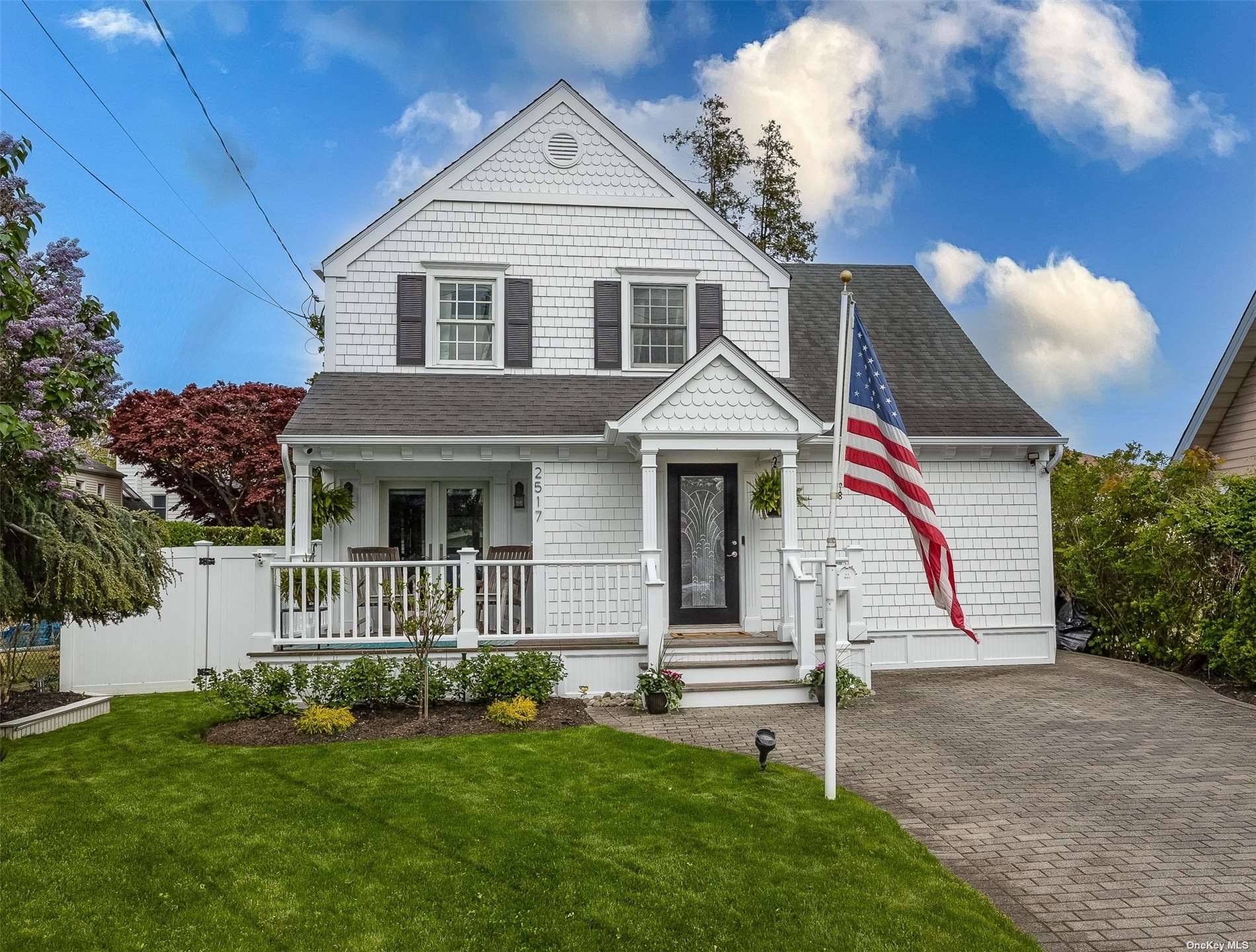 Beautiful colonial with stunning curb appeal right in the heart of the desirable Oceanside Terrace !