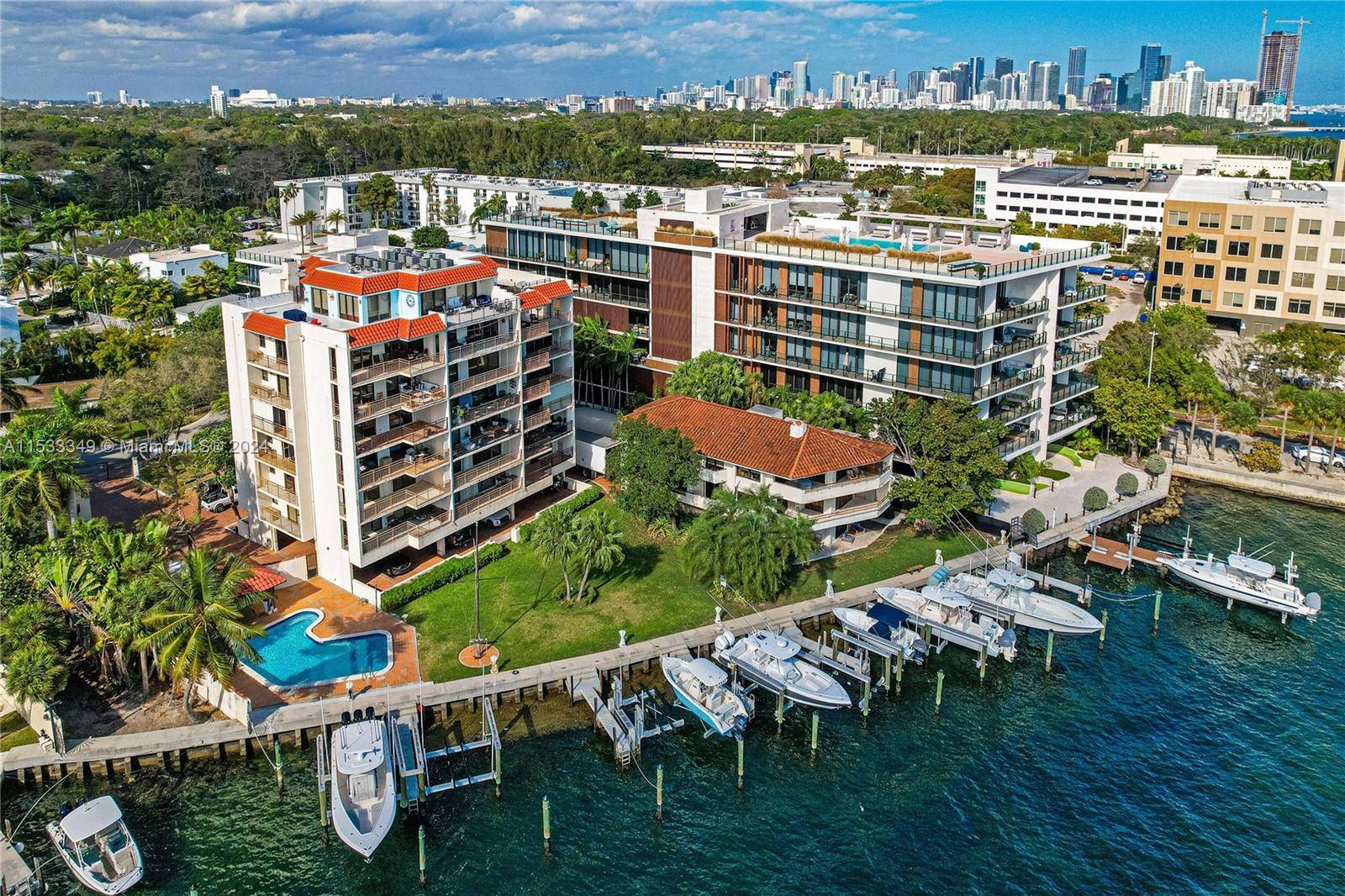Discover the essence of waterfront luxury living in this exquisite 2 2 ; Nestled within a prestigious Coconut Grove boutique building.