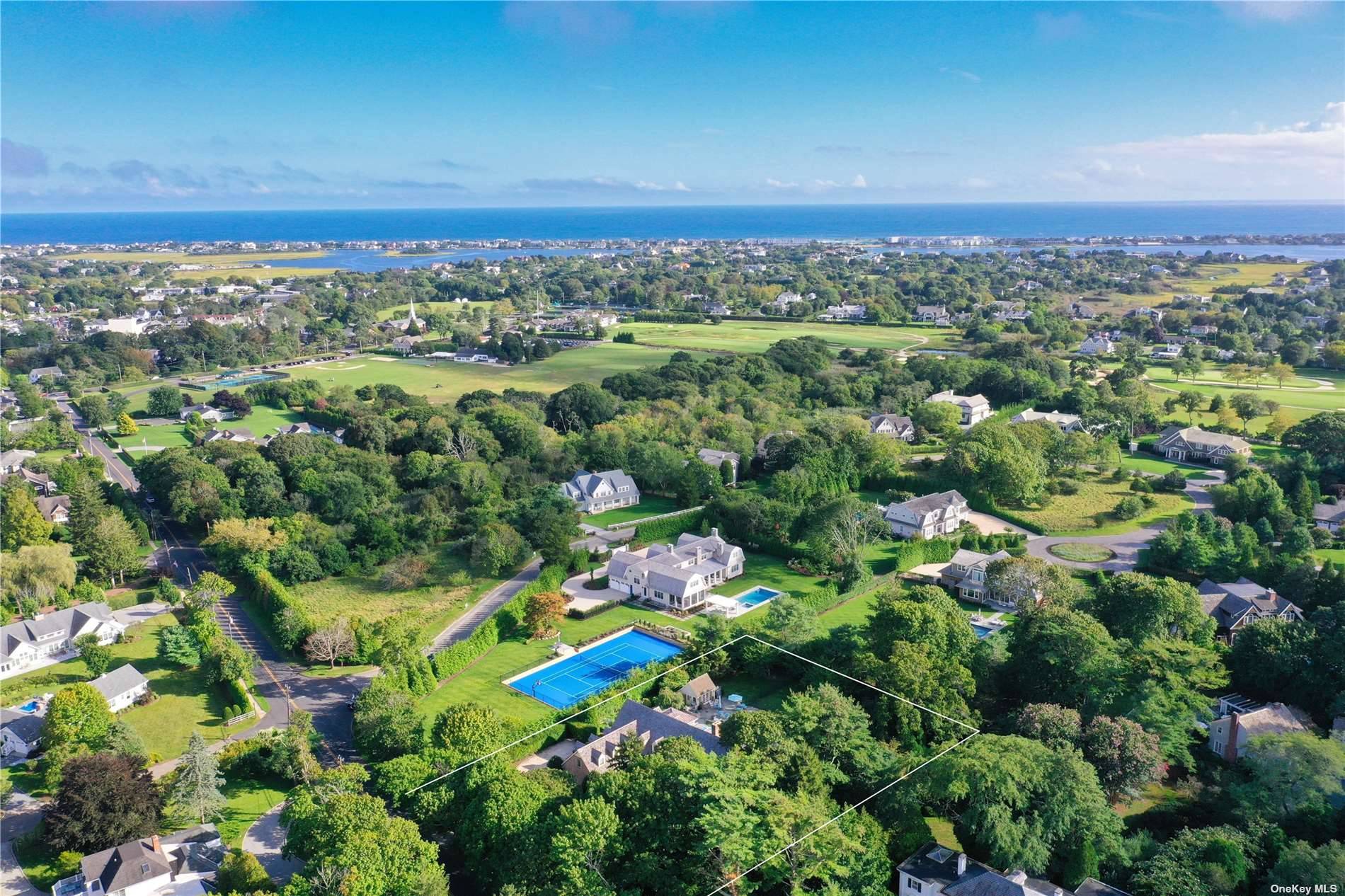 In the vibrant heart of Westhampton Beach Village, find a residence where post modern design dances harmoniously with luxurious refinement.