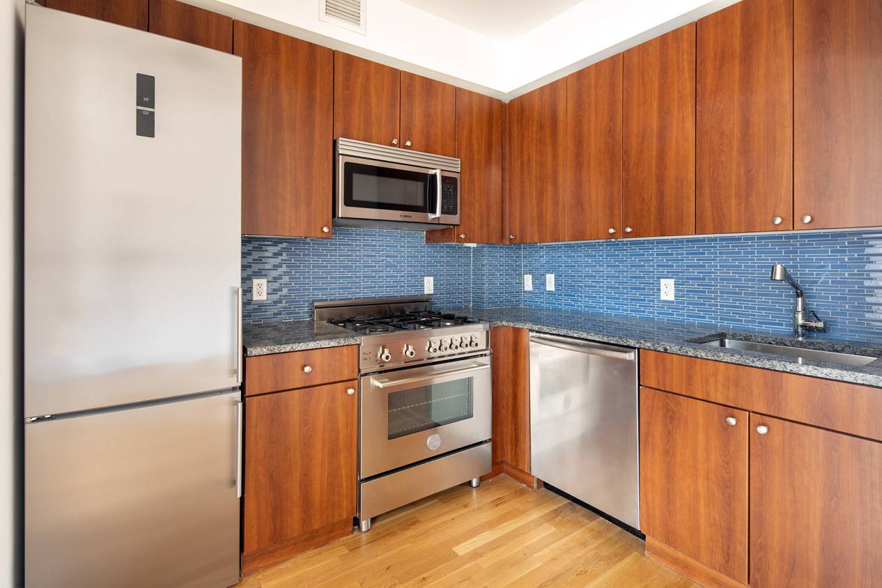 Terrific large studio apartment features gourmet kitchen with Liebherr appliances and a Bosche washer dryer, tons of closet space.