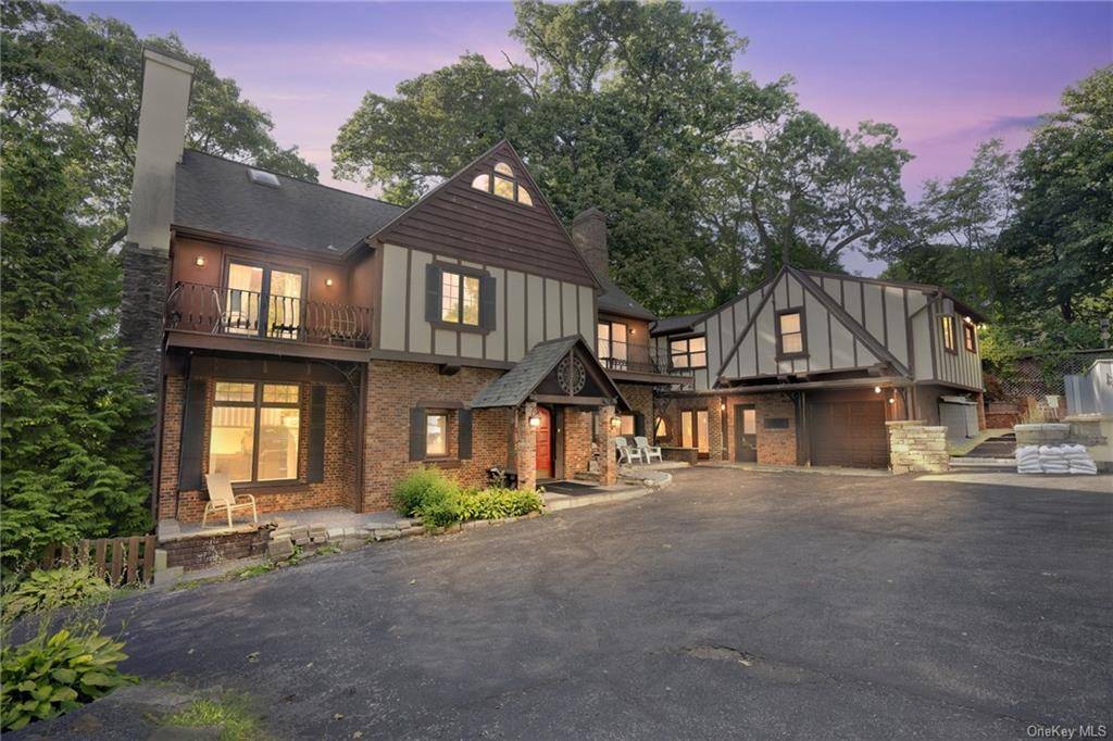 Nestled amidst the serene beauty of Westchester County, this alluring 5 bedroom Tudor residence embodies the essence of timeless elegance and modern luxury.