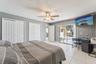 Third bedroom with view of pool