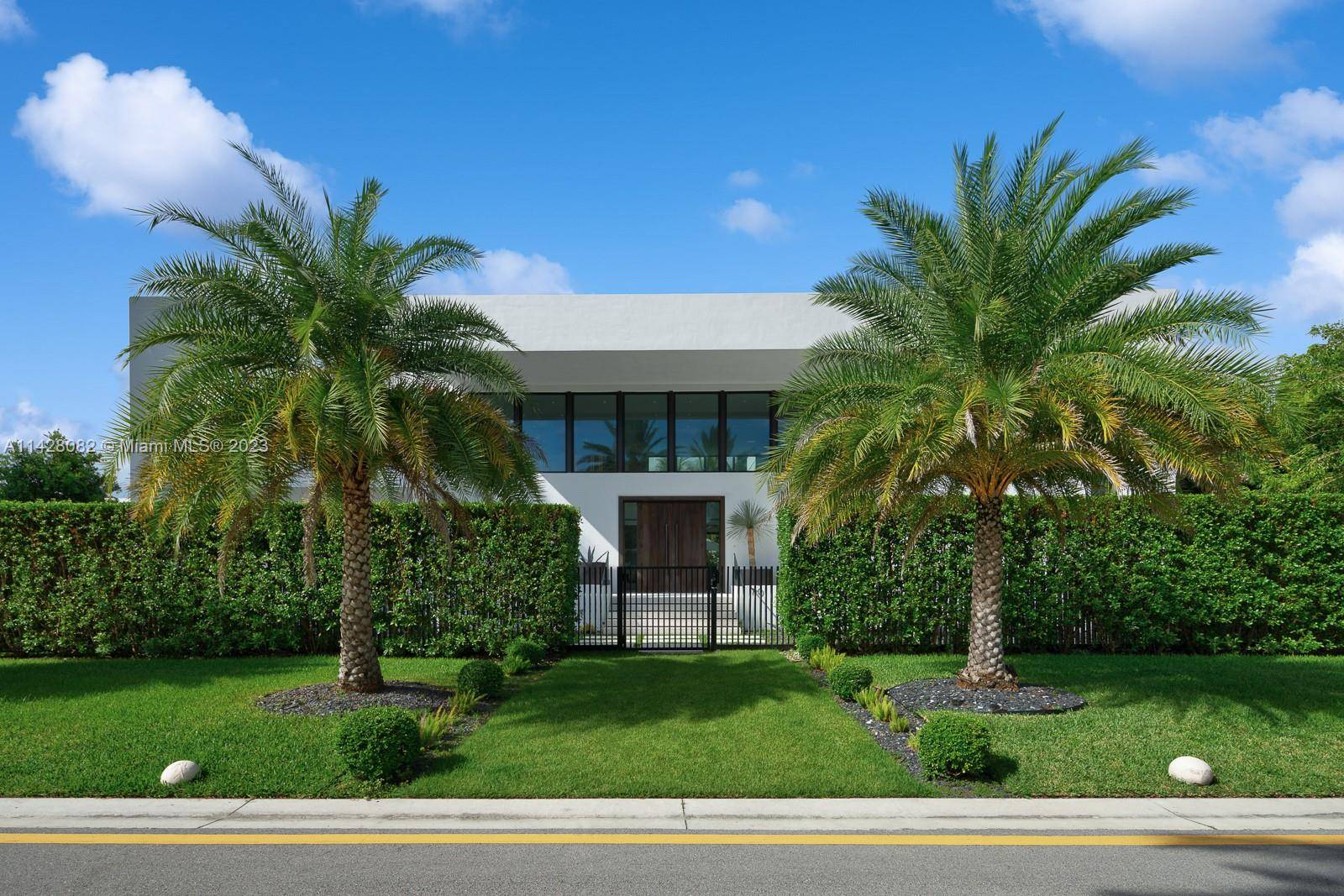 Exquisite oasis nestled in Miami Beach's prestigious Hibiscus Island on an oversized lot.