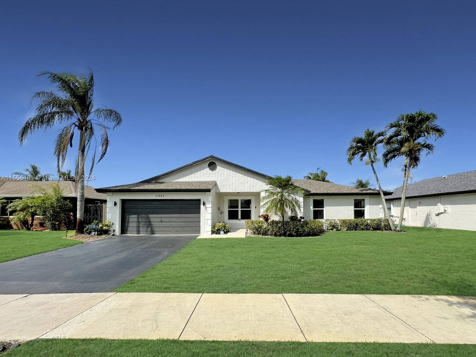 IMAGINE YOURSELF IN THIS STUNNING 3 BED, 2 BATH HOME IN SOUGHT AFTER FLAMINGO GARDENS.