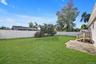 View of fenced backyard