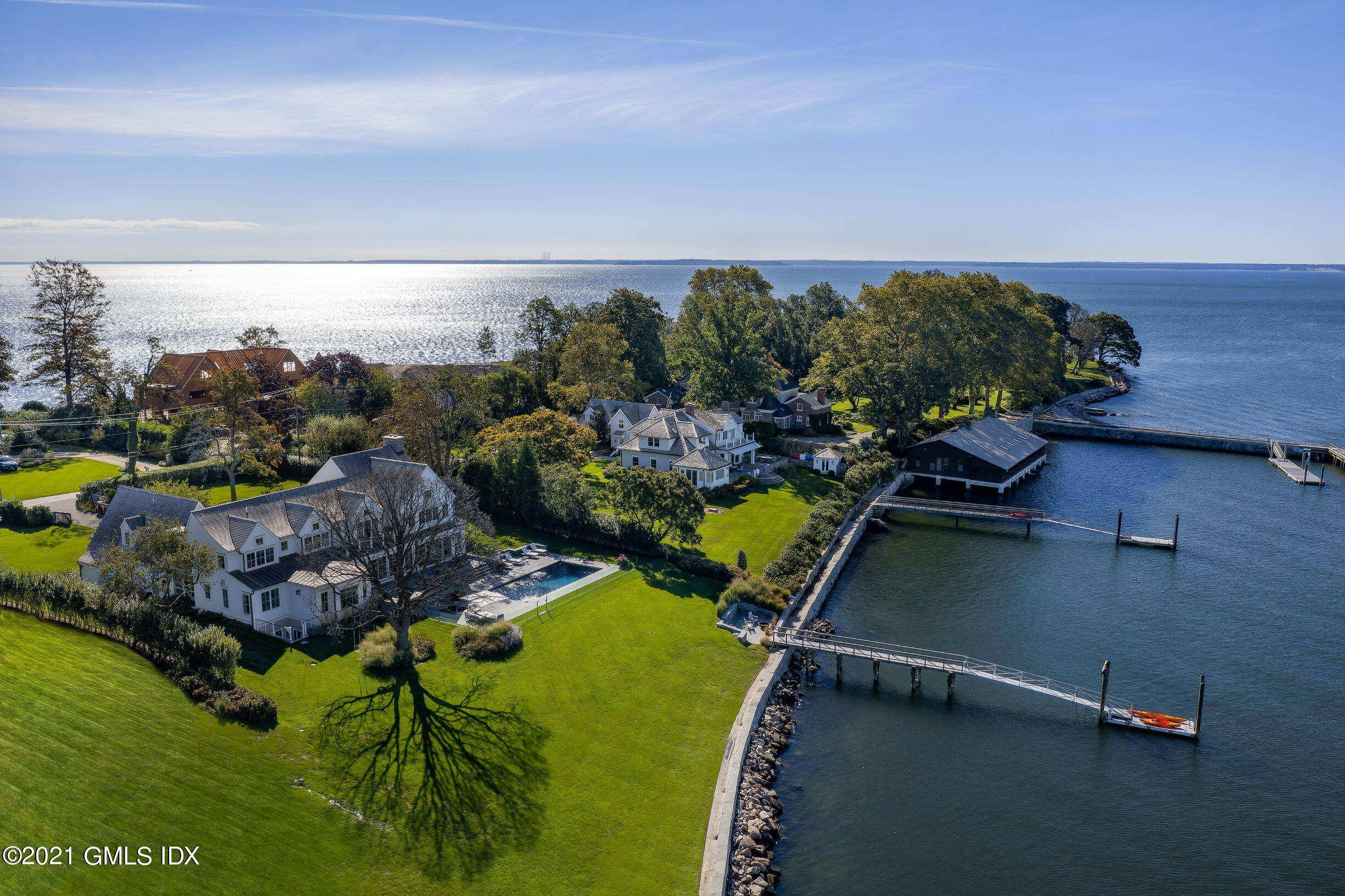 Exceptionally stylish newly rebuilt home in one of the most picturesque waterfront settings imaginable.