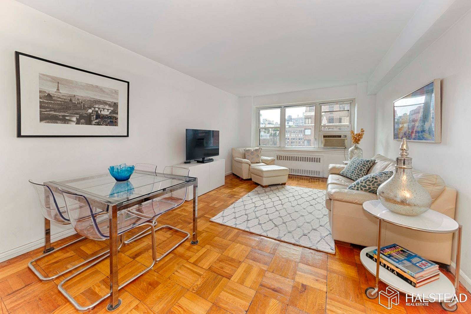 This sun filled and quiet home is located on the fourteenth floor of the West Wing of Schwab House and it is set back from the street over the building's ...