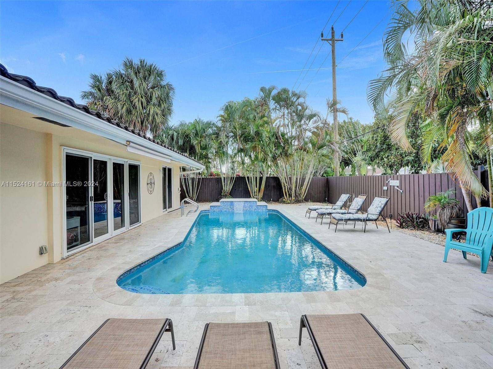 Once a sought after vacation rental, this property is now available for long term lease, offering an open floor plan that frames a lush, private backyard.
