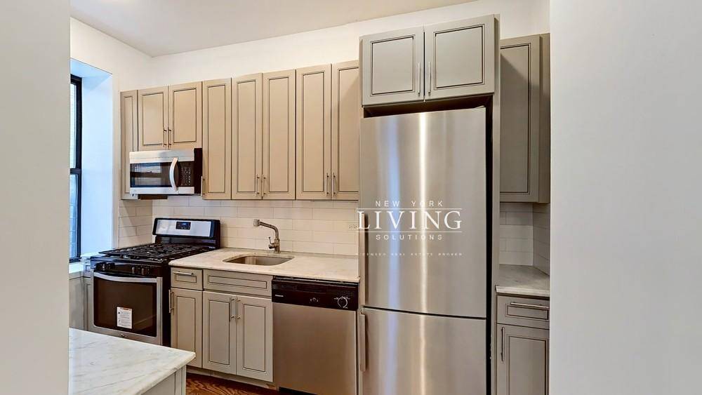 Available Now ! Newly renovated 4 bedroom 2 Bath apartment in beautiful elevator building with laundry !