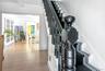 Staircase featuring wood finished floors