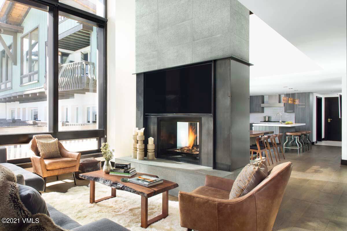This unparalleled 4 bedroom Lodge at Vail condominium, features a suave, modern mountain interior design with an elongated balcony with a gorgeous view of Vail Mountain.