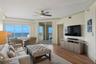 Expansive ocean views become the backdrop of the family room, creating a space that feels both peaceful and endlessly inviting.