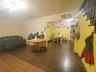 Playroom with dark wood-style floors