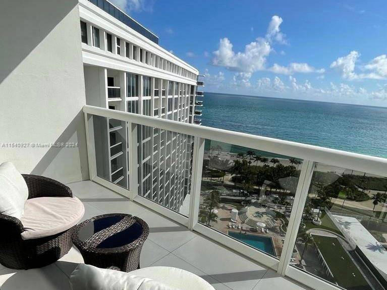 DIRECT OCEAN VIEWS. Indulge in the ultimate oceanfront lifestyle with this stunning, fully furnished two bedroom, two bathroom condo at The Harbour House in prestigious Bal Harbour.