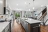 Kitchen Island with sink makes meal planning and entertaining a breeze