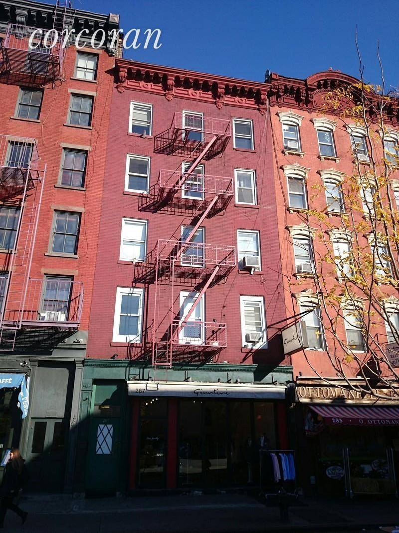 287 Bleecker, a 5 story walkup apartment building located between Jones Street and 7th Avenue that is 2 blocks from the subway.