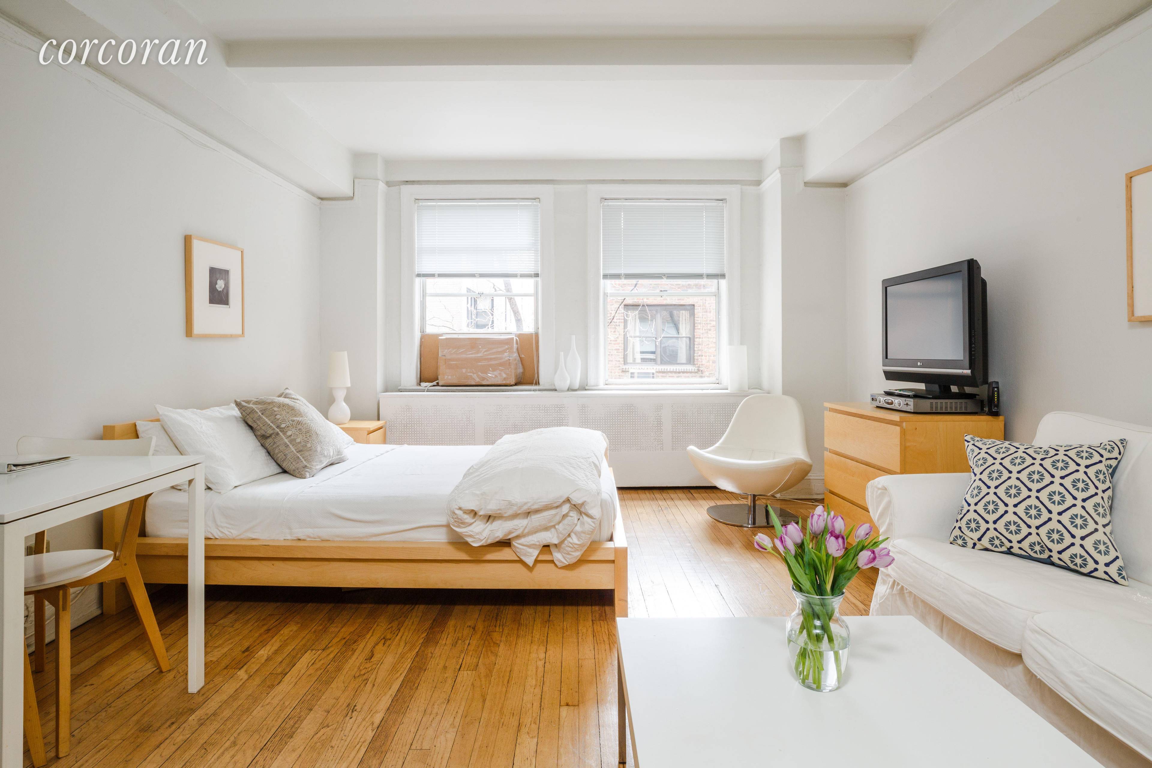 Sunny furnished studio in the heart of Murray Hill has concierge service.