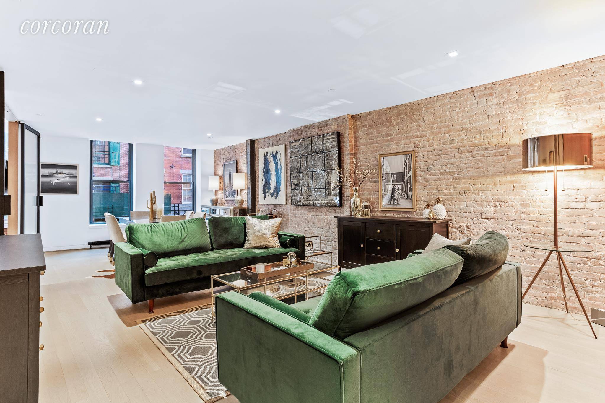Luxury, loft like two bedroom two bathroom condominium apartment on a picturesque cobble stone street in trendy South Street Seaport !