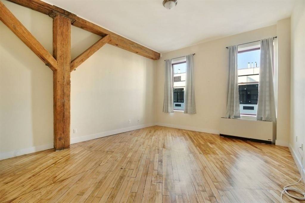 Classic Loft Living at The Mill Building, one of Williamsburgs premier condo conversions.