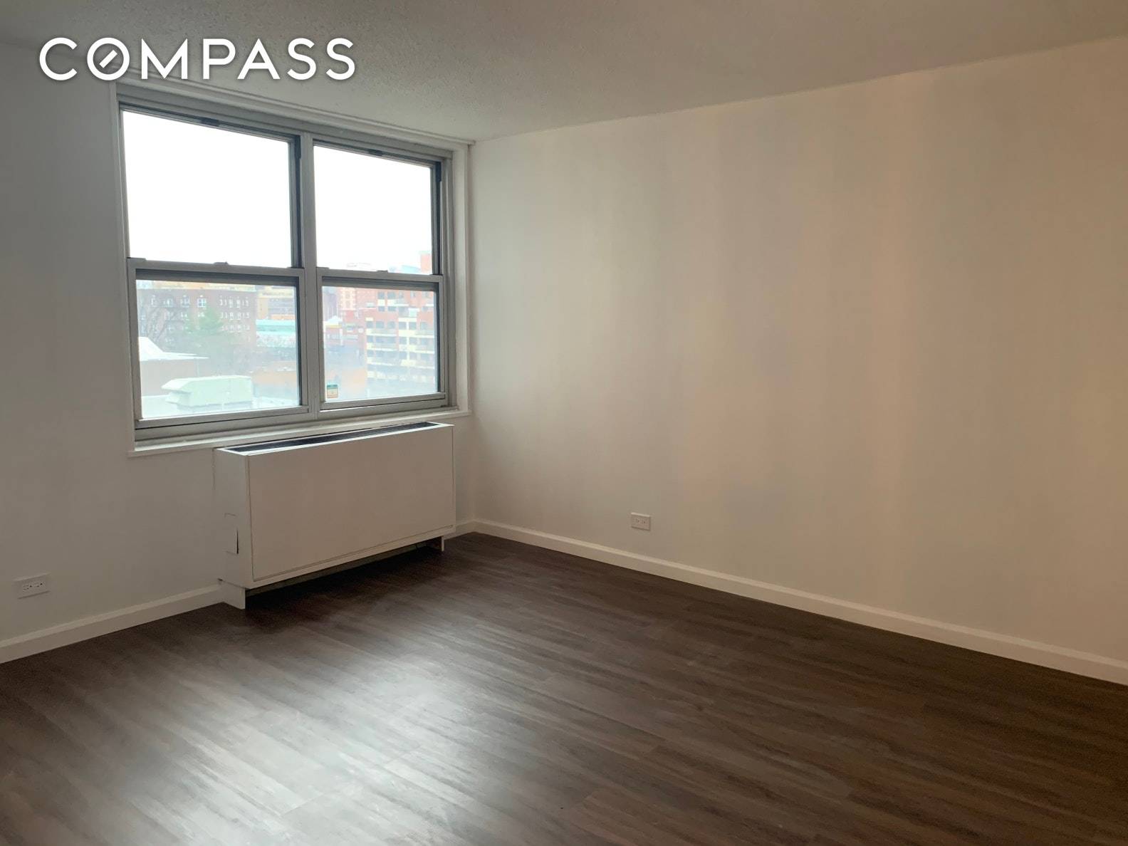 In heart of downtown Flushing, Newly renovated 2 Bedrooms 1 Bath Kitchen Lr Dr