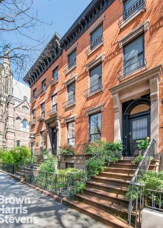 This prominent 1850 Federal is nestled on a picturesque, tree lined street, and showcased amongst an impressive row of Historic District townhouses.