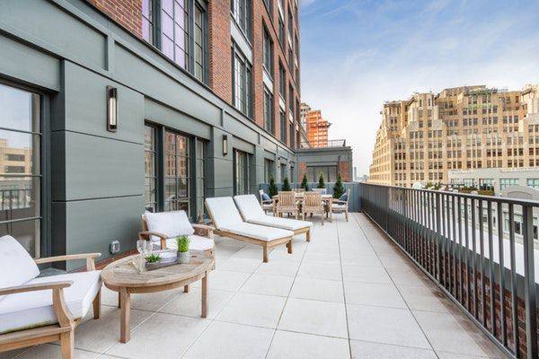 Summer is here ! Enjoy it on your very own terrace in this West SoHo New Development jewel.
