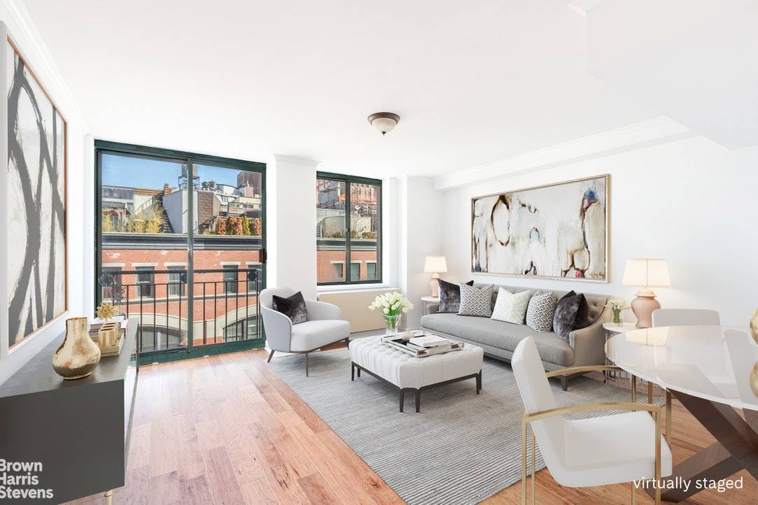 Enjoy the best of downtown living in this sunny 1 bedroom 1 bath apartment in a full service Tribeca condo.