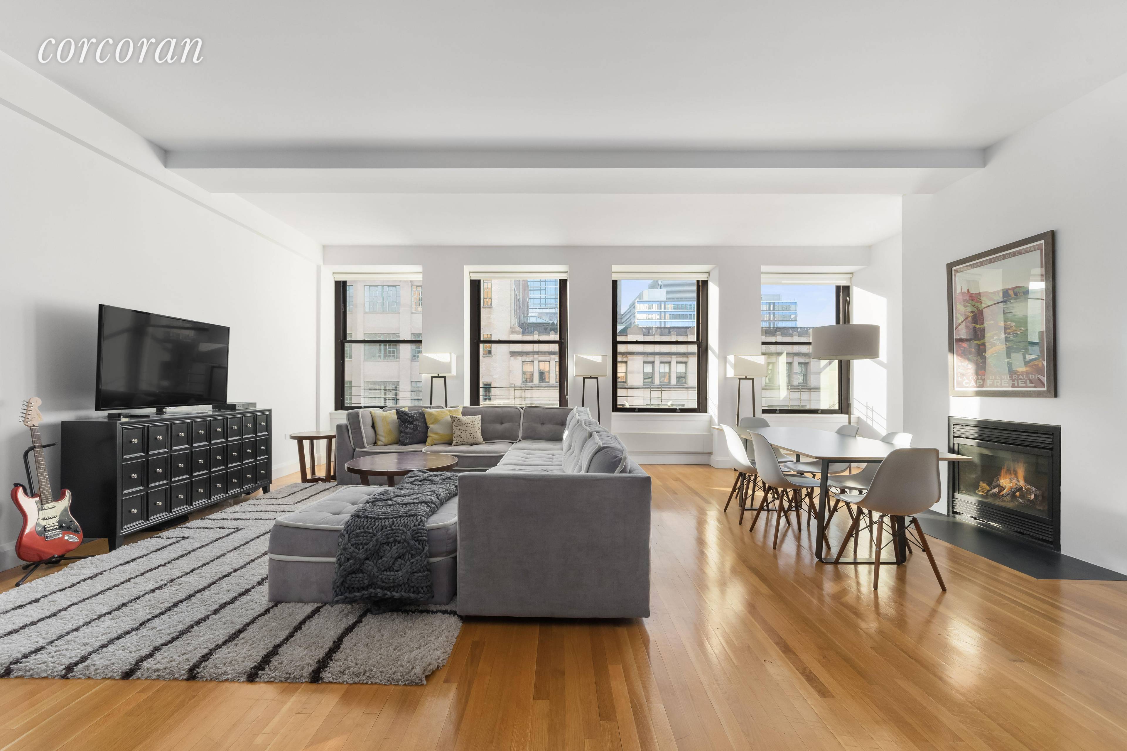 In the heart of Tribeca, this spacious and sunlit loft apartment features all the luxuries of a modern home in a full service boutique condominium.