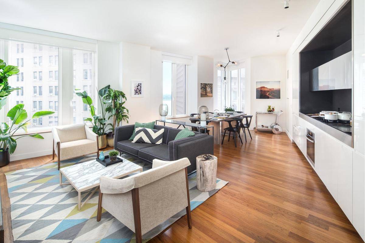 Situated on southern point of the building, this well designed split two bedroom, two bathroom E line residence measuring 1, 300 square feet features spectacular views of downtown New York's ...