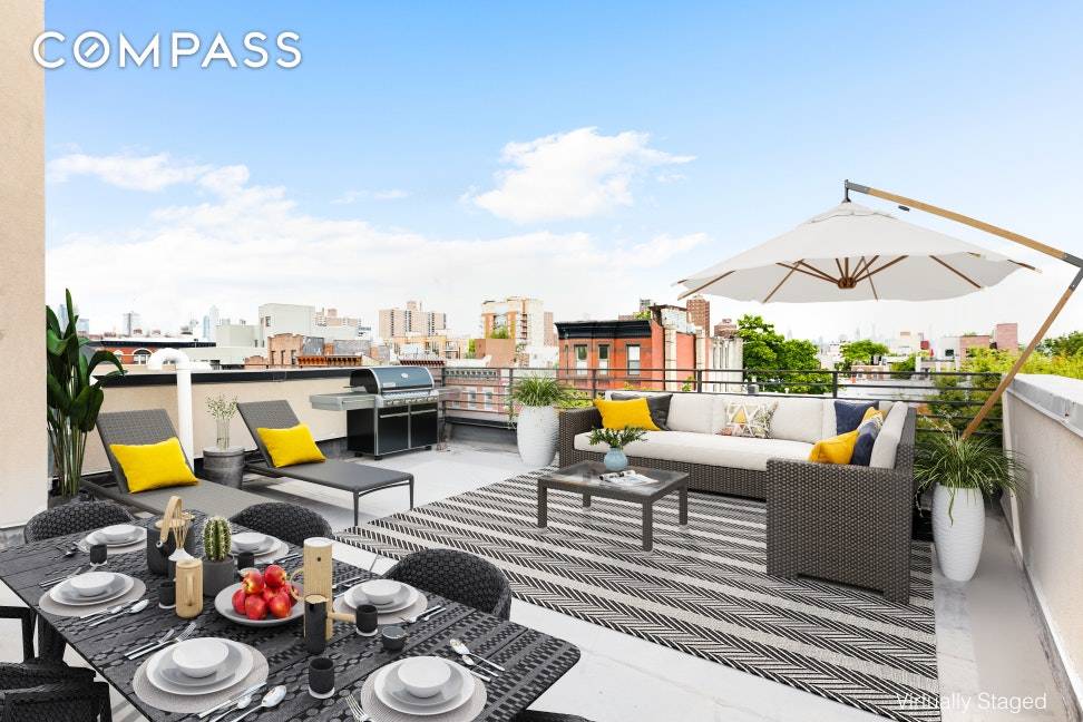 The sun shines all day long in this sleek 2 bedroom, 2 bathroom penthouse duplex with two large roof decks and a balcony measuring 923 SF as well as a ...