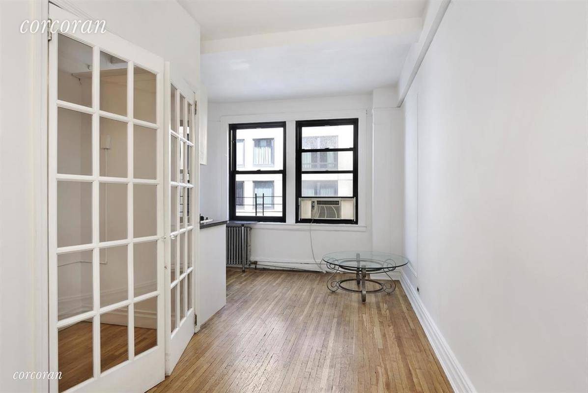 So convenient to Central Park, this Alcove Studio has been converted to a Junior 1 BR.