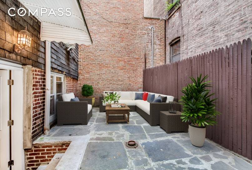 Pictures Show Apartment Virtually Staged Abingdon Square Park two bedroom garden apartment offering a 250 square foot private outdoor patio with beautiful stone work.