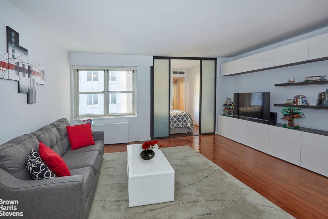 Wonderful quiet and light converted one bedroom apartment in a luxury Midtown West Condo West53rd 7th Avenue.