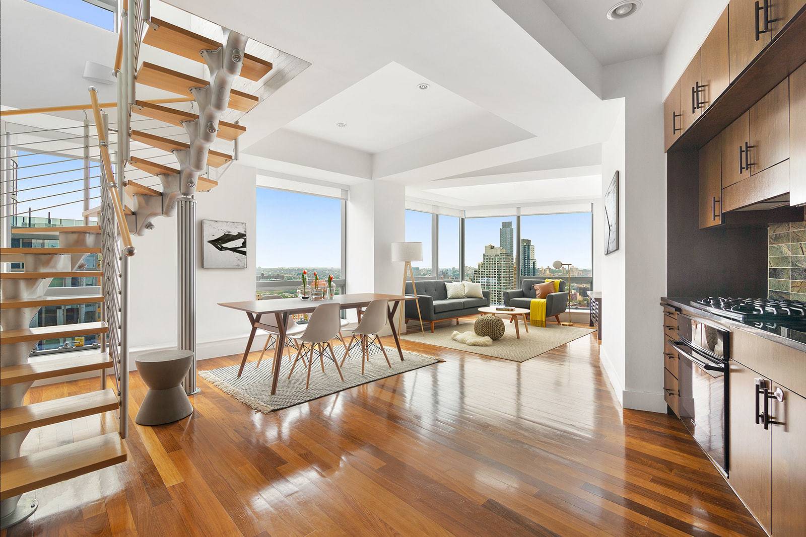 The quintessential penthouse apartment, complete with a duplex layout, sprawling entertaining floor, and three truly separate bedrooms and bathrooms.