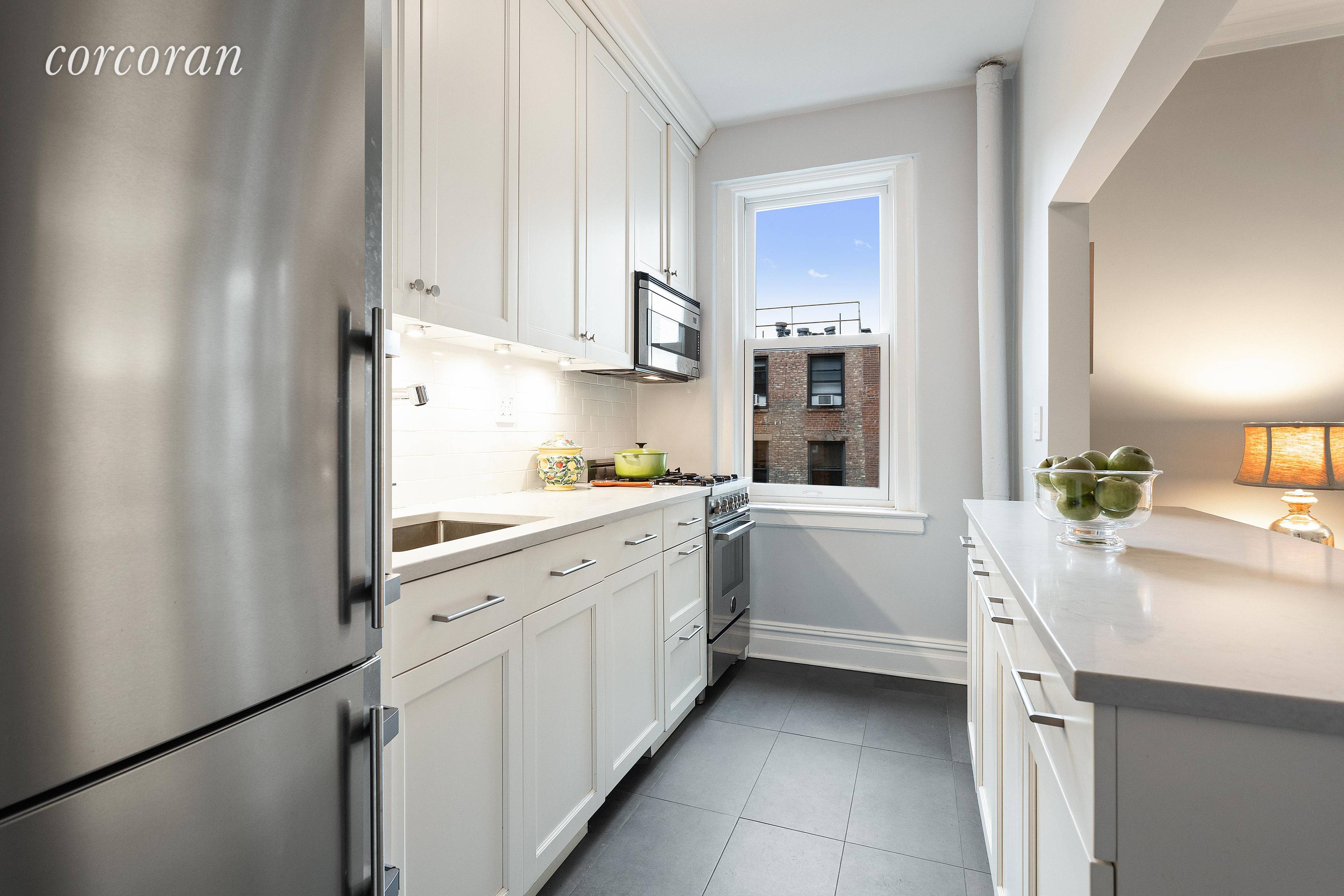 PREWAR BEAUTY ! This lovely home has been exquisitely renovated and couldnt be prettier.
