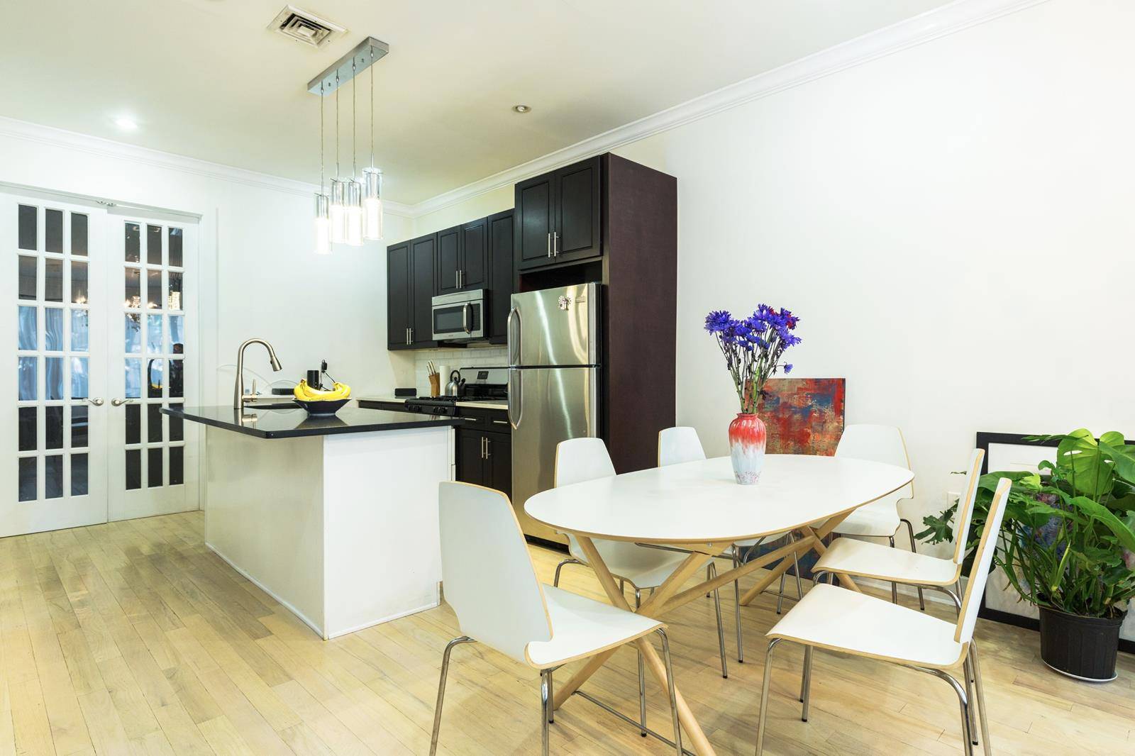 This fully renovated two family townhouse comes fully equipped with brand new plumbing, electrical, and luxury finishes.
