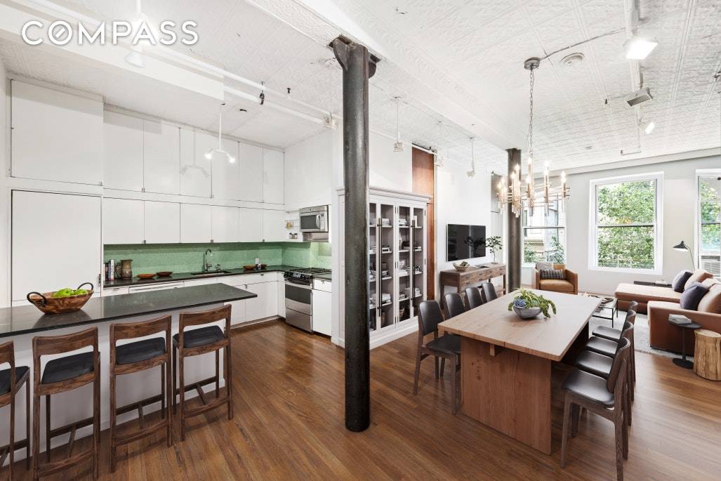 Bright Classic 2BR Chelsea Loft Featuring South sun and massive arched windows, this amazing two bedroom classic loft features an open floor plan, soaring 11 foot tin ceilings and cast ...